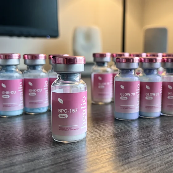 Healio Peptides vials held in the hand