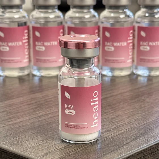 Healio Peptides vials lined up on a desk