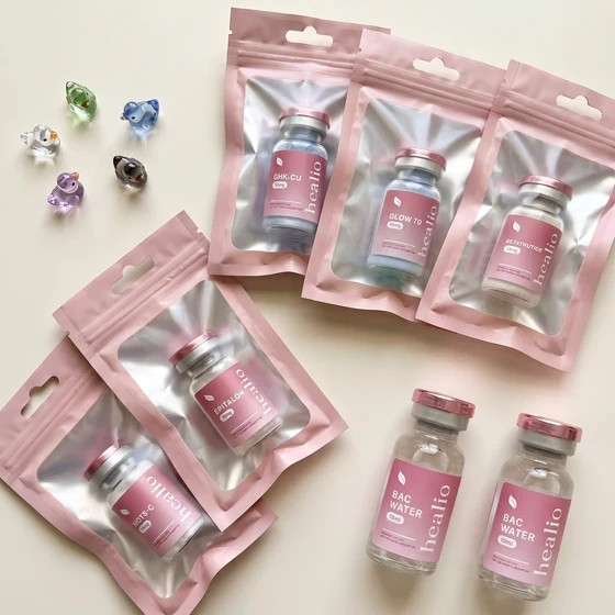 Healio Peptides pouches flat-laid on a desk