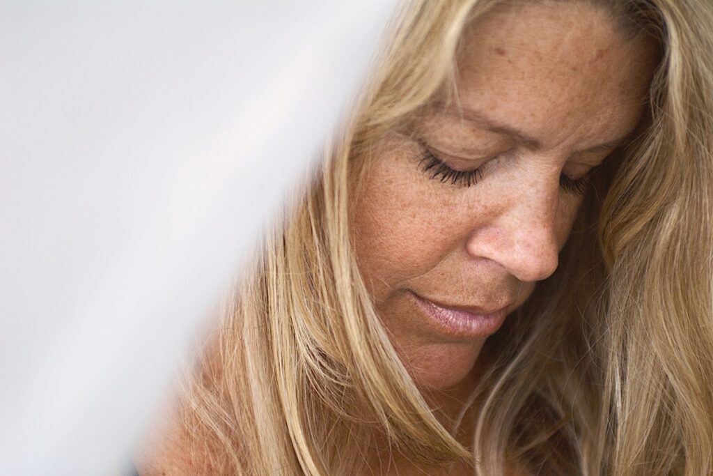Close portrait of a woman with a calm expression