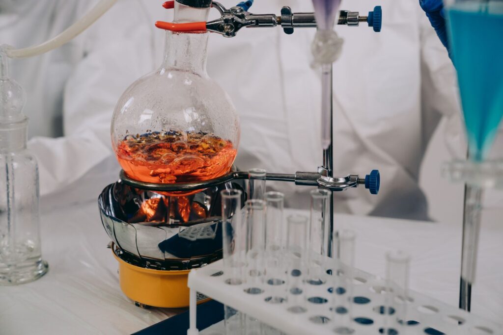 Chemistry laboratory flasks and vials arranged during analysis