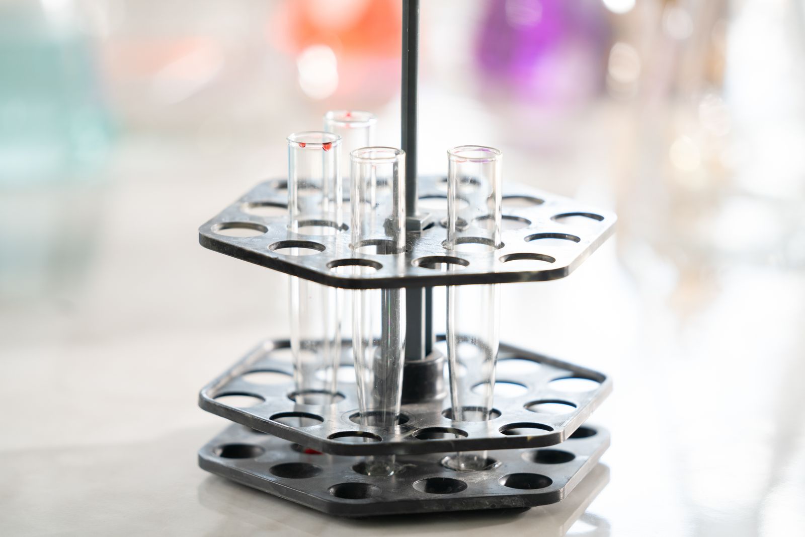 Empty test tubes held in a laboratory rack