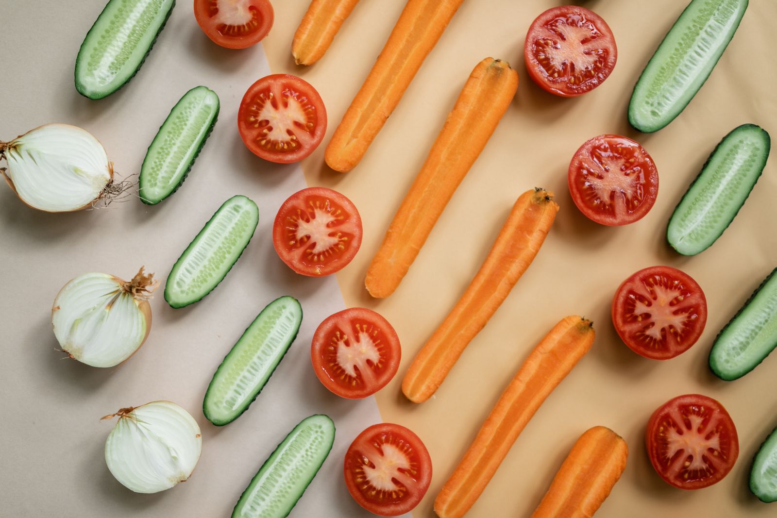 Fresh sliced vegetables arranged on a board from above