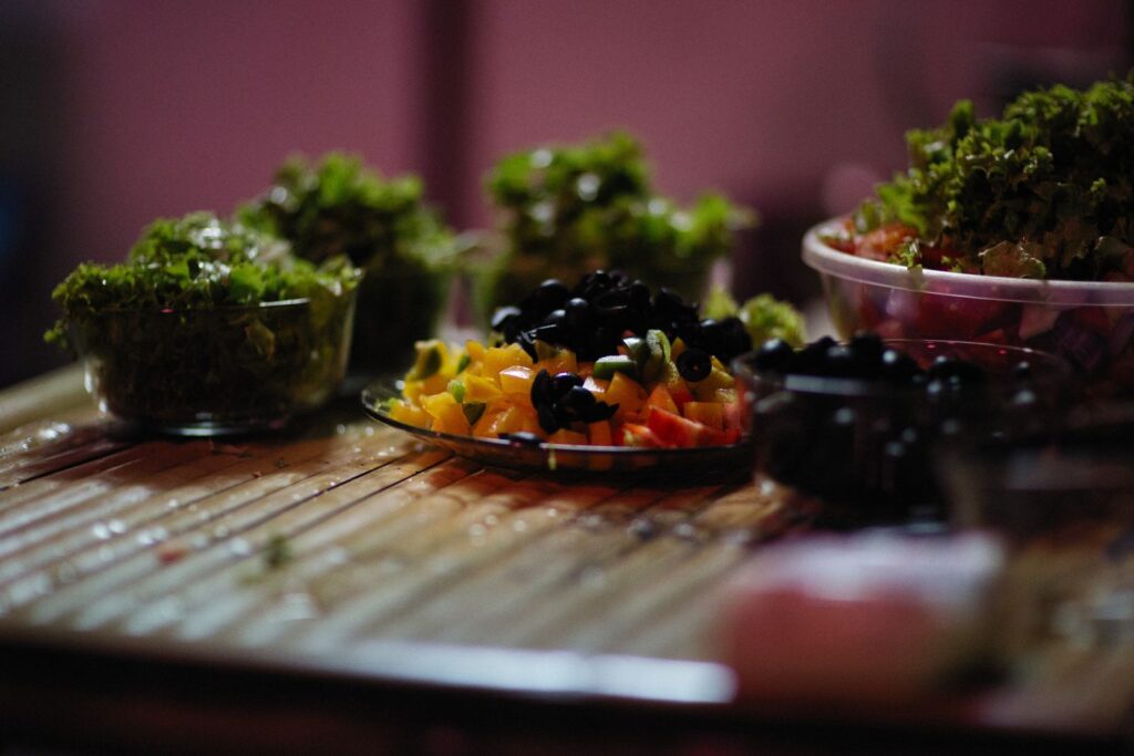 A vegetable salad with fresh greens and olives