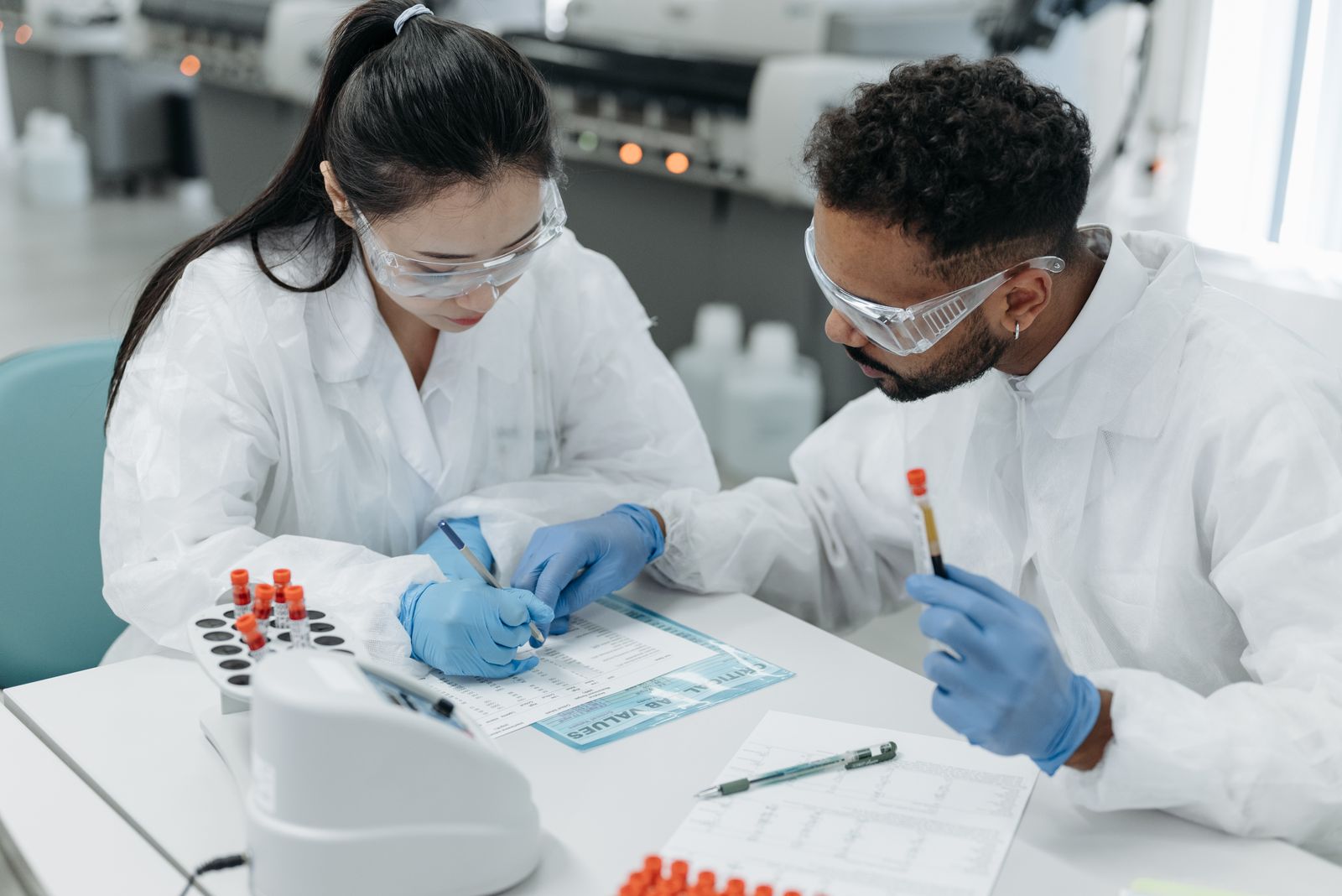 Researchers in a lab reviewing scientific data together